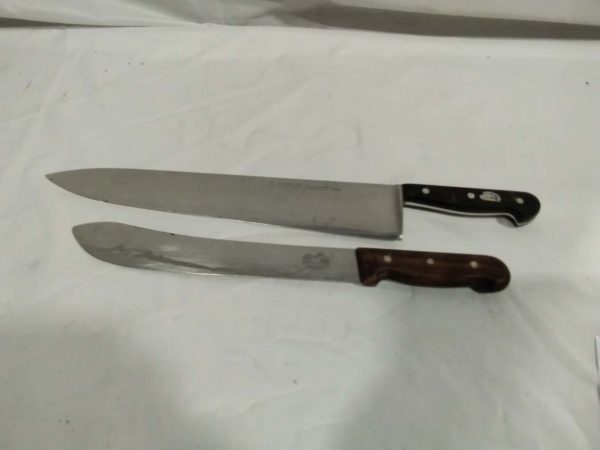 lot 550 2 butchers knives – 1 is swiss other by so lingen