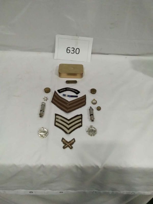 lot 630 Daily mail Princess Mary tin containing Military badges & whistles