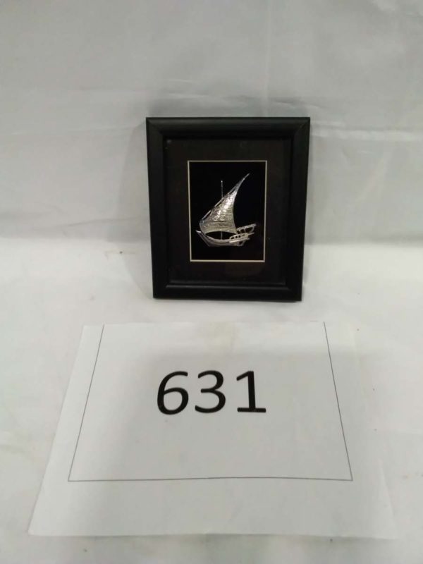 lot 631 Framed picture of a sterling silver ship