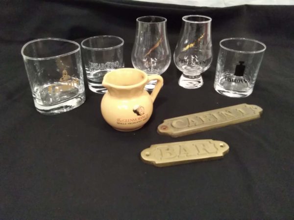 lot 688 Breweriana whiskey glasses & water jug, brass bar & cabin signs