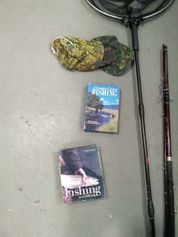 lot 706 landing net & 2x match rods, books & hats - Image 2