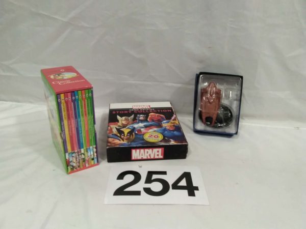 lot 254 Books including Ladybird, Marvel & a Star Trek Vulcan model