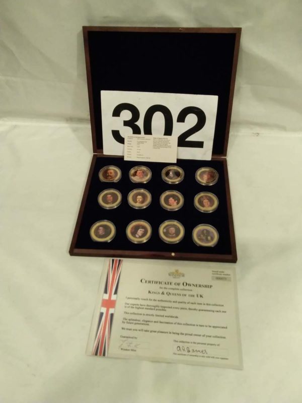 lot 302 cased kings & Queens 12 coin set