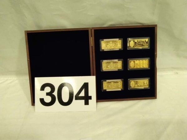 lot 304 cased set of 6 gold plated bank note ingots