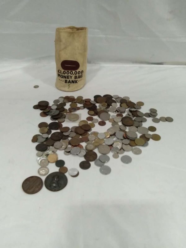 lot 384 old coins & money bag