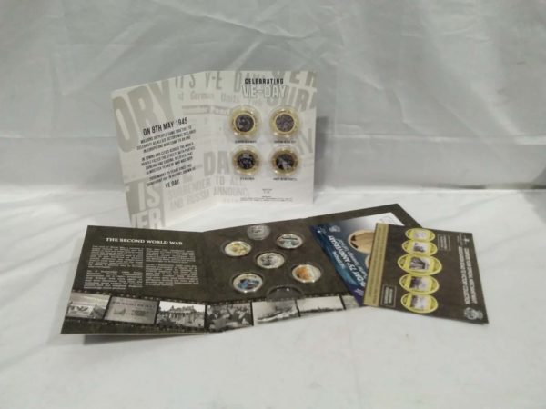 lot 548 VE Day ( complete) & Road to Victory ( not complete) collectable coin sets