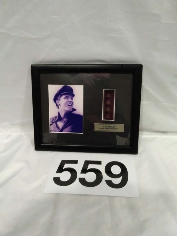 lot 559 framed genuine Elvis Presley film cell