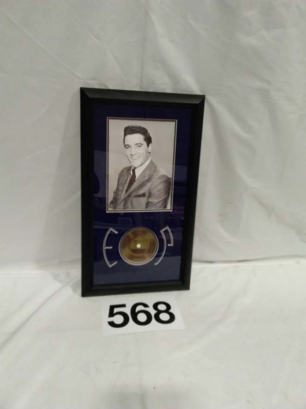 lot 568 framed genuine piece of Elvis Presleys hair