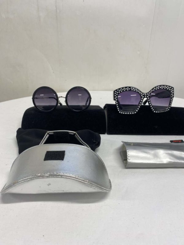 LOT 1005- TWO PAIRS OF SUN GLASSES -BOTH NON BRANDED- WITH CASES